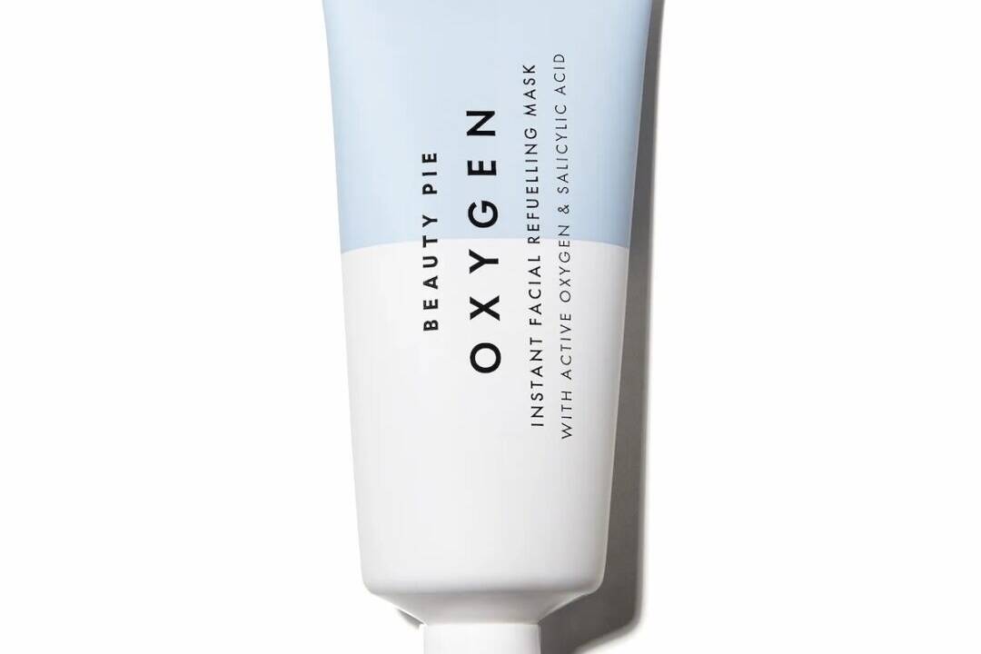 A tube of oxygen hand cream on a white background.
