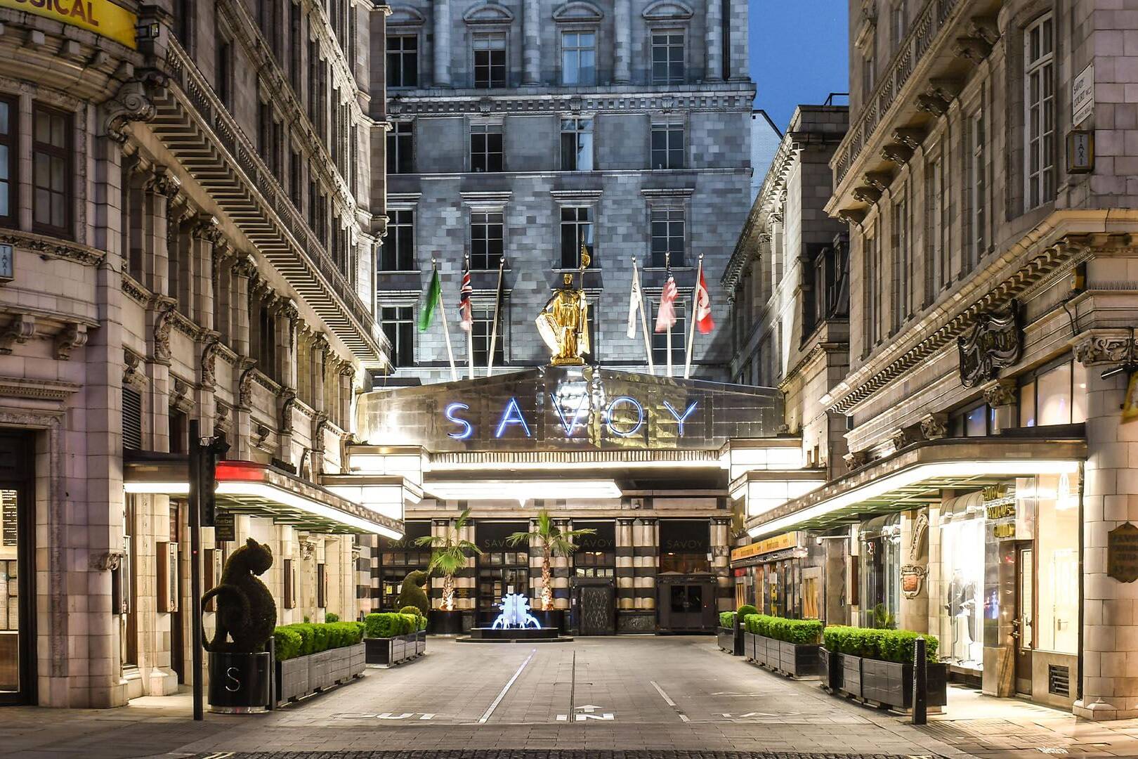 The savoy hotel in london at dusk.